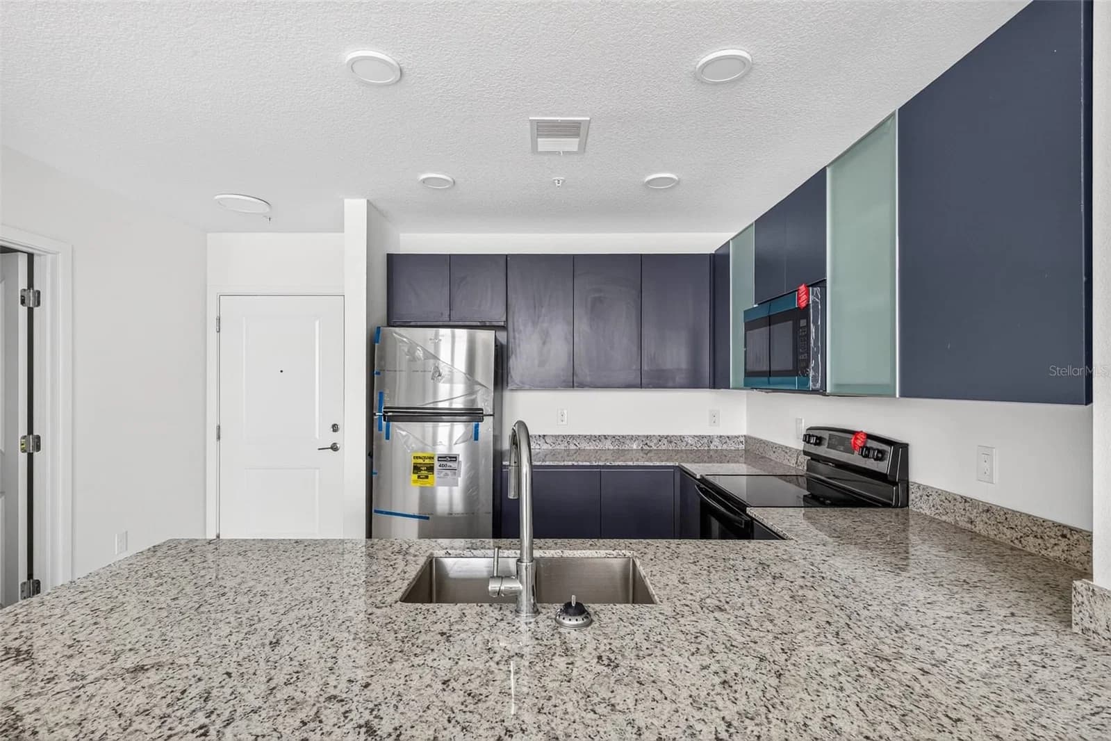 Photo 4 of 5563 MILLENIA PARK BLVD #517