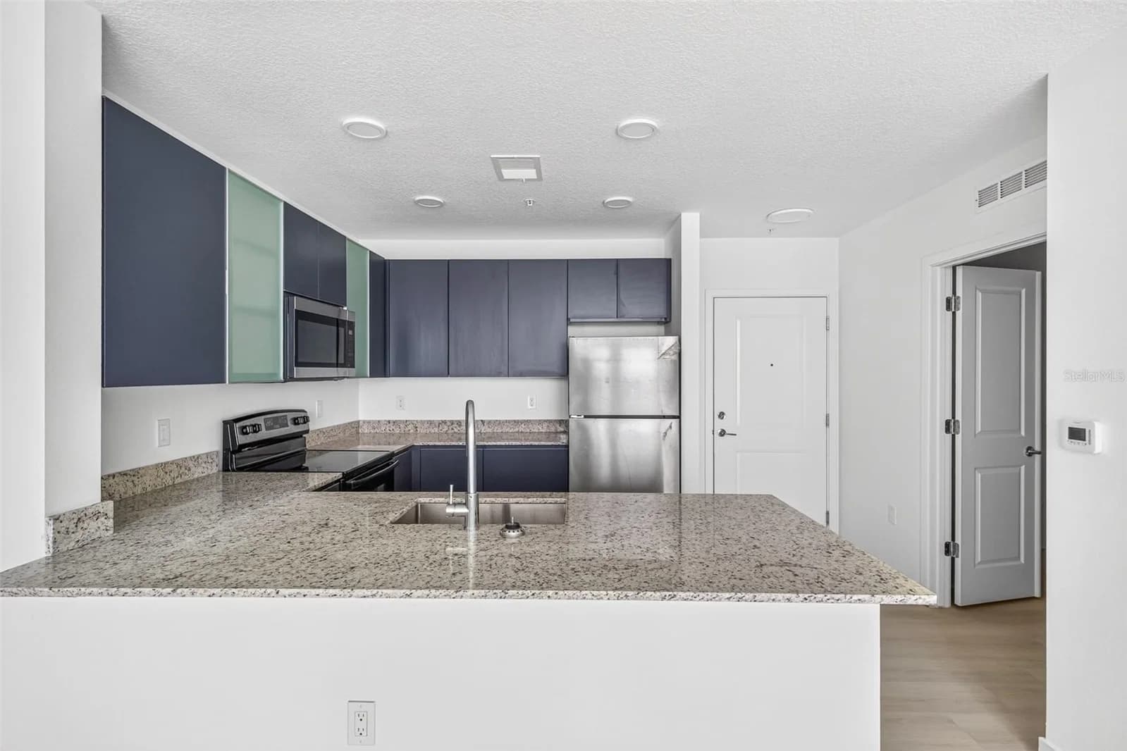 Photo 4 of 5563 MILLENIA PARK BLVD #503