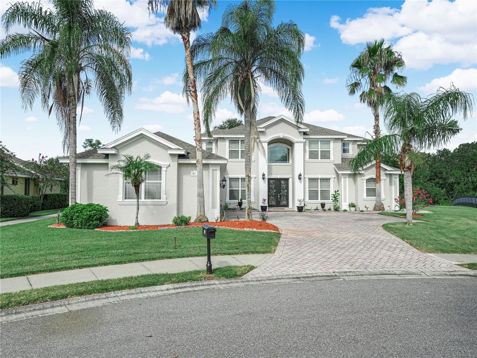 565 WHISPER WOODS Drive